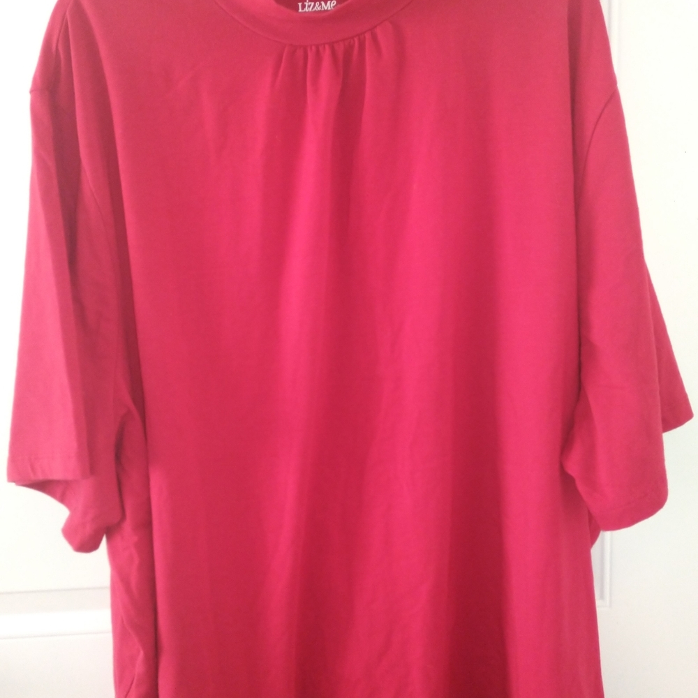 Red short sleeve turtleneck shirt.